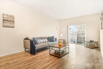 Spacious living area looking towards your balcony!