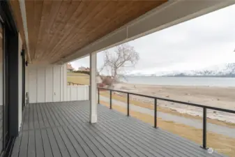 Large deck off main floor with lockable storage underneath