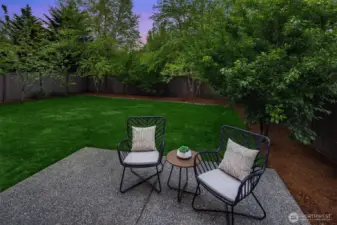 Inviting, fully fenced yard offers a private, tranquil retreat