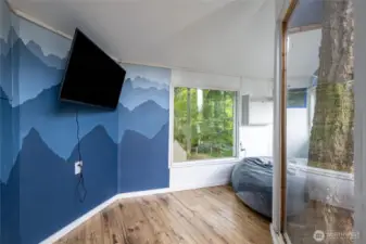 A view of the inside of the tree fort, complete with electricity!