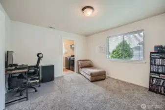Spacious mid room just off garage