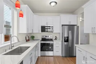 All brand new SS appliances, quartz countertops, & 40" shaker cabinets!