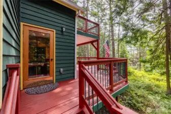 Generous, freshly stained decks surround the home