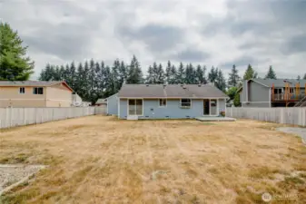 Plenty of room to play, garden, or add your own touches to this spacious yard