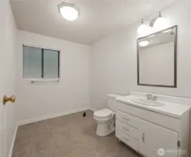 huge down stairs bathroom ready for a tub or shower