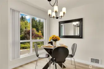 Lovely dining space with serene views to Goff Creek Reserve