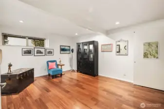 Lower level office/den is incredibly spacious and has a built in murphy bed.