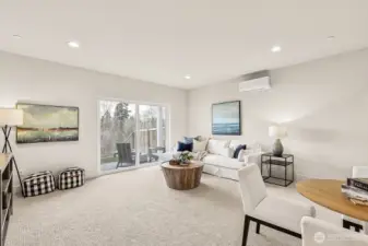 Photo of light and bright basement on lot 4 at Moorlands Grove. Walk out to large yard with beautiful views and protected area behind home.