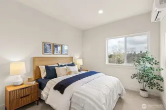 Photo of lower-level basement bedroom, model home on lot 4 at Moorlands Grove.  Gorgeous mountain and territorial views.  Home backs to protected space.