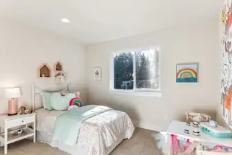 Second story bedroom, 4 bedrooms up, 1 on main floor and 1 in basement. Photo of the Sienna at Paisley Court.