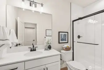 Photo of lower level, basement bathroom on lot 4 at Moorlands Grove.  Bedroom and bonus room in basement.