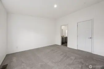 This angle shows why split-bedroom layouts are so popular. The primary suite is set apart from the other bedrooms, giving you a little breathing room and a lot more quiet. The walk-in closet and en suite bath are tucked right into the suite, keeping everything efficient and easy. It’s a thoughtful layout choice that makes the home feel more polished and grown-up.