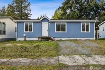 From the sidewalk, the vinyl windows stand out in the best way. Installed in 2022, they offer better insulation, easy upkeep, and a crisp, modern look that won’t require constant repainting or repairs. It’s the kind of practical upgrade that quietly improves comfort and efficiency, while still keeping the exterior sharp and current.