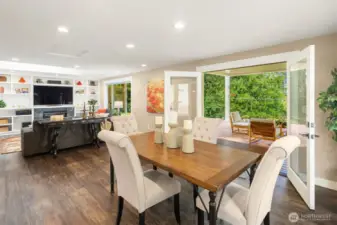 Adjacent to the living area are French doors that lead to the partially covered composite deck.