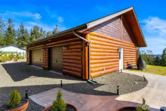 1200 sq fit fully finished garage with 220V power and 3rd garage door on the far end makes for an ideal space for all your vehicles, toys, and projects.  Built to the same fantastic level of quality as the home.