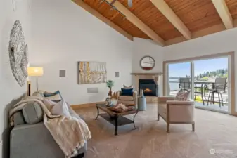 Great room living with soaring ceilings and gas fireplace