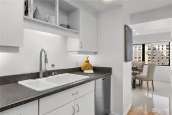 Open shelving on the sink side of the kitchen.