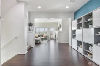 Main floor with builder upgraded hardwood flooring throughout