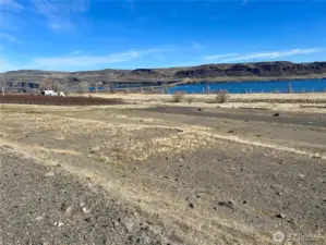 This sloped lot is ideally suited for a multi-story house plan