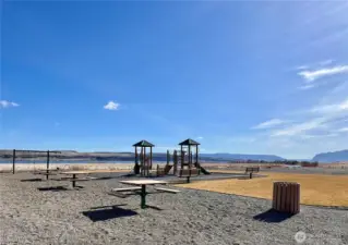 Park area with picnic tables and play structure!