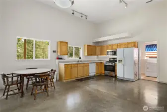 Kitchen eating area in accessory dwelling of shop