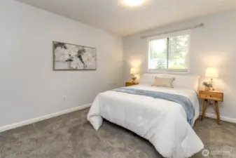 Extra bedroom with new carpet.