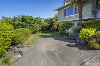 This home has SO MUCH to offer:   ~There is extra parking that can also be used for bringing in bark or landscape elements, etc.  ~Fully-Updated Kitchen and Bathrooms  ~Extensive Hardwood Flooring  ~New Hot Water Heater  ~Newer AZEK Deck and Railing  ~ Vinyl Windows  ~Brand New Main Water Line  ~Sprinkler System  ~Professionally Landscaped Yard  ~ Carefully Maintained Roof for longevity  ~Lennox Furnace  ~Some Fresh Paint  ~2 Gas-Log Fireplaces  ~Flex Space and a Potential 4th Bedroom space in Lower-Level  ~Oversized 2-Car Garage with Storage and Work Space  ~Crown Molding, Recessed and Updated Lighting