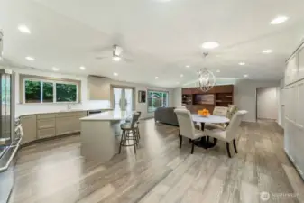 You're immediately embraced by an effortless flow of space from the kitchen. Be sure to admire the kitchen island – its clever and functional storage solutions are a must-see!