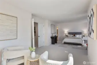From the cozy sitting area, enjoy peaceful treetop views through oversized windows and a fresh, airy palette with crisp white walls and soft new carpeting throughout. The spacious layout offers a sense of calm and versatility — perfect for a reading nook, yoga space, or quiet morning retreat.