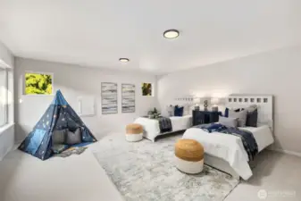 Expansive and flexible, this oversized fourth bedroom offers endless possibilities—whether you need a shared room, hobby space, home gym, or play area. Fresh carpet and updated lighting make it a welcoming, move-in ready retreat.