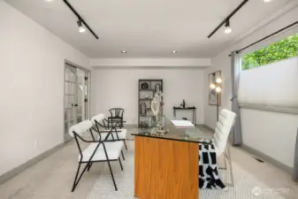 Large office close to the front door has a private deck. (1of 3)