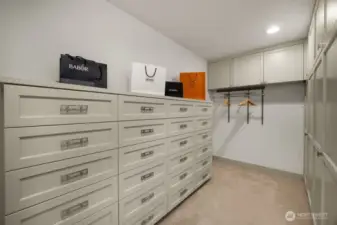 Large walk-in closet in primary bedroom suite.