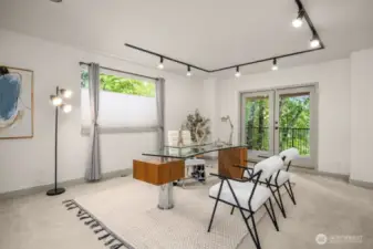 Large office close to the front door has a private deck. (1of 3)