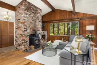 This vertical plank construction home offers the warmth of the outside with its cedar planks on the exterior walls.