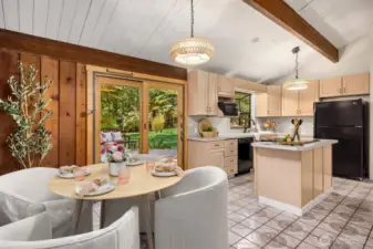 Open concept dining and kitchen make for a smooth flow.
