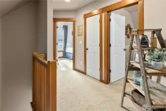 Landing upstairs leading to two bedrooms and a bathroom.