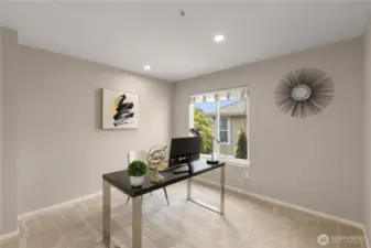 Upper-Level Open Den — great for a study nook, library, or lounge area