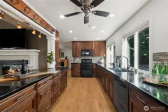 Gorgeous updated kitchen! Includes ceiling fan, open passthrough to the living room.