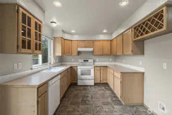 Lots of cabinets for storage in kitchen