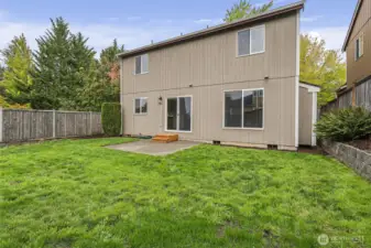 Patio is perfect for BBQing and ample space for gardening