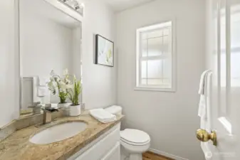 Inviting main floor half bath.