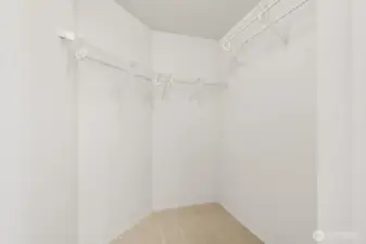 Primary bedroom walk-in closet.
