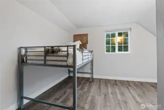 Bright and comfortable bedroom on the upper level.