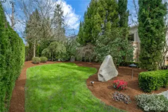 A serene, garden-style front yard creating a warm and inviting first impression.