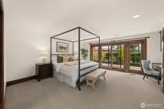 A secondary primary suite designed for comfort and privacy, complete with a refined en-suite bath