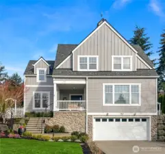 The home showing the two car garage with I-Beam installation for greater span plus an EV charger and NACS included.