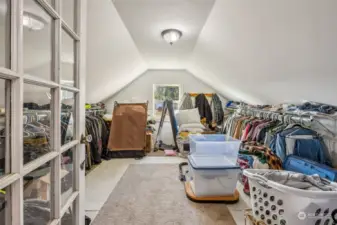 Currently used as huge walk in closet, this room could be used for various other purposes.