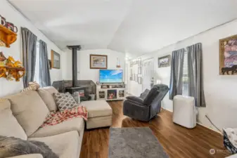 ADU living room with woodstove.