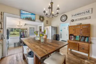 Another view of the kitchen. The mud room can be seen in the background. The kitchen and home have mini splits for added comfort year around.