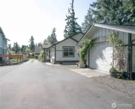 Paved driveway with easy access to home and garage.